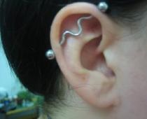 Allt om piercingar i öronen: typer av piercingar, historia, tips och örhängen Lång piercing